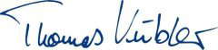 Handwritten signature in blue.